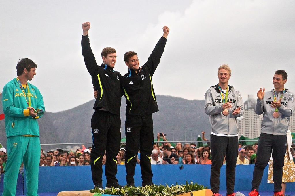 Burling and Tuke mount the podium prior to being presented with their Olympic Gold Medals as Silver medalists Australia and Bronze medalists, Germany look on - Mens 49er - 2016 Sailing Olympics &copy; Richard Gladwell www.photosport.co.nz